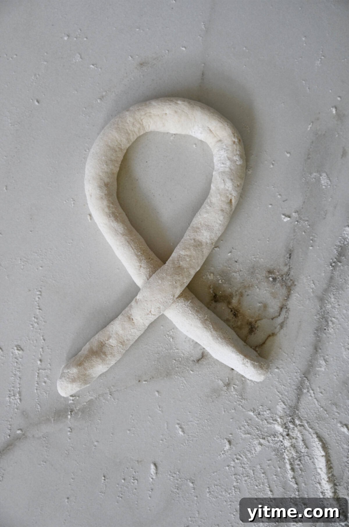 Making a loop with the pretzel dough