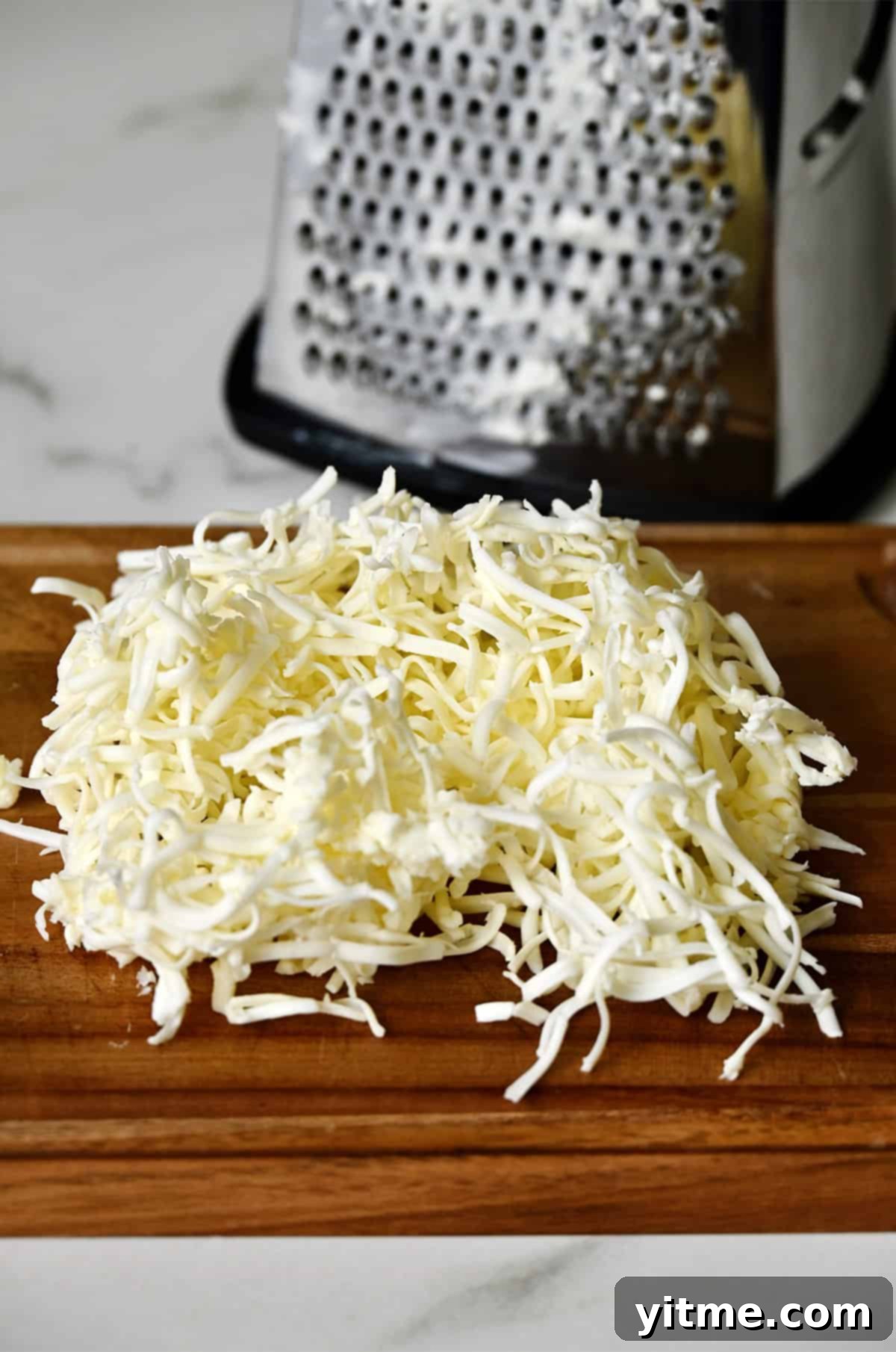 Grated butter on a cutting board.