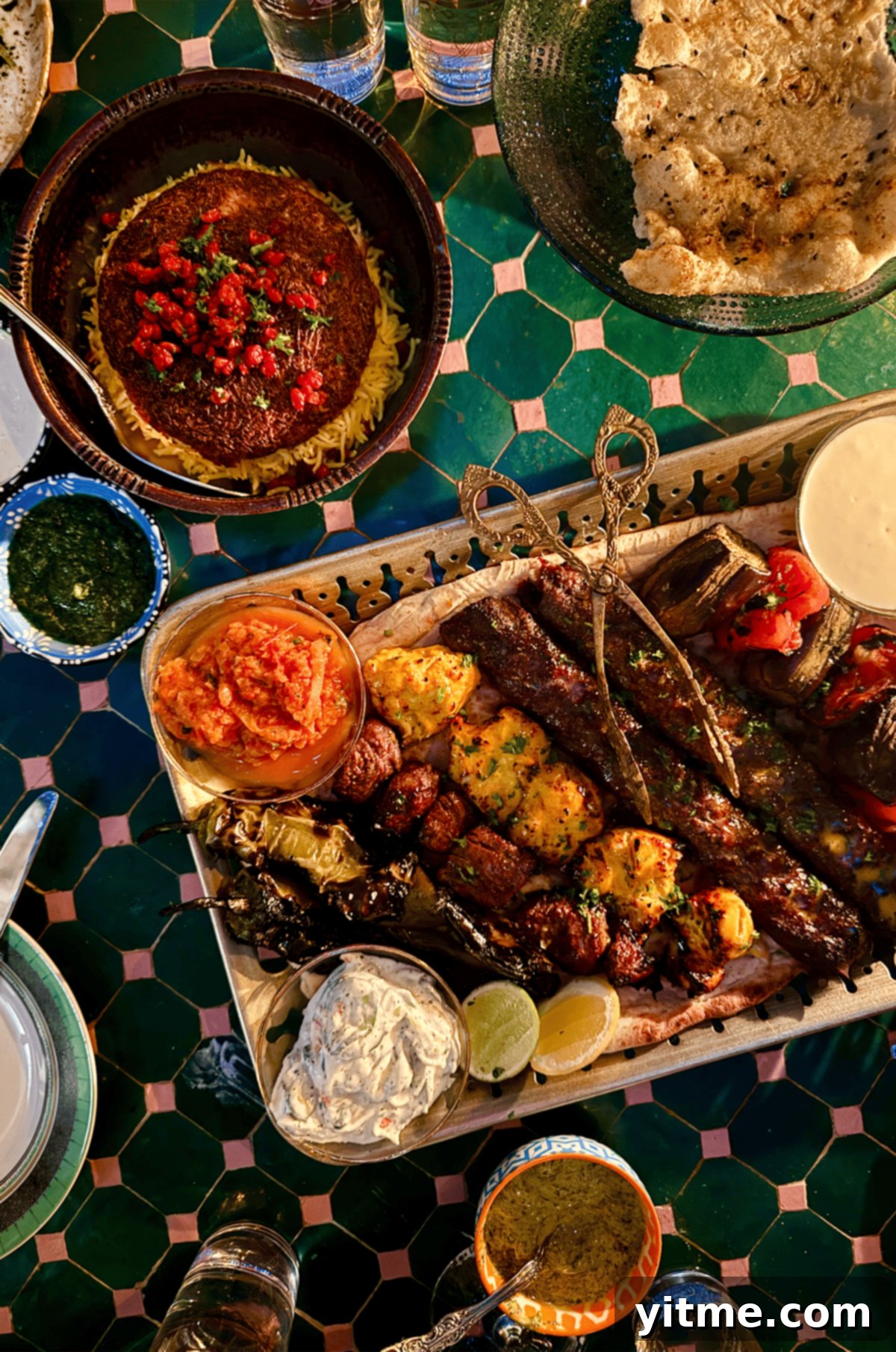 Leila restaurant in North Park, San Diego, showcasing their Persian tahdig topped with pomegranate seeds.