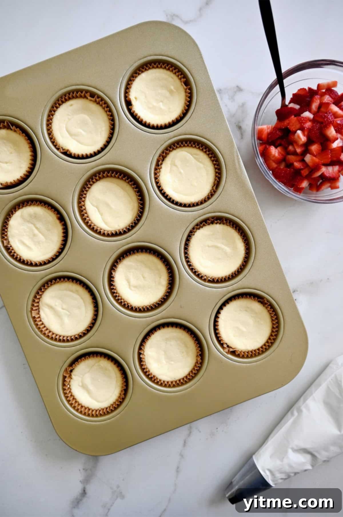 Baked mini cheesecakes cooling
