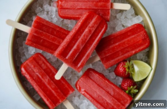 Strawberry Margarita Popsicles with Lime and Strawberries