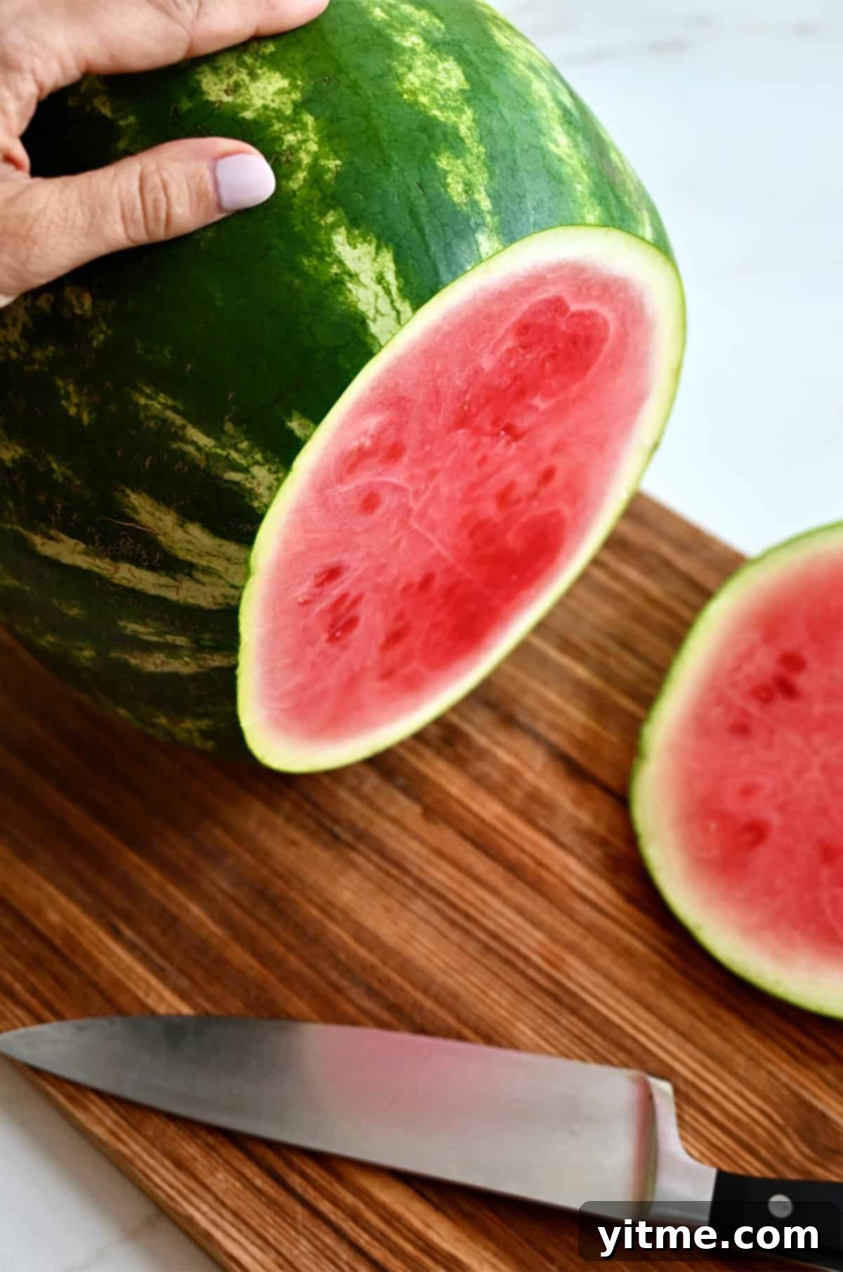 The top of a watermelon cut off.