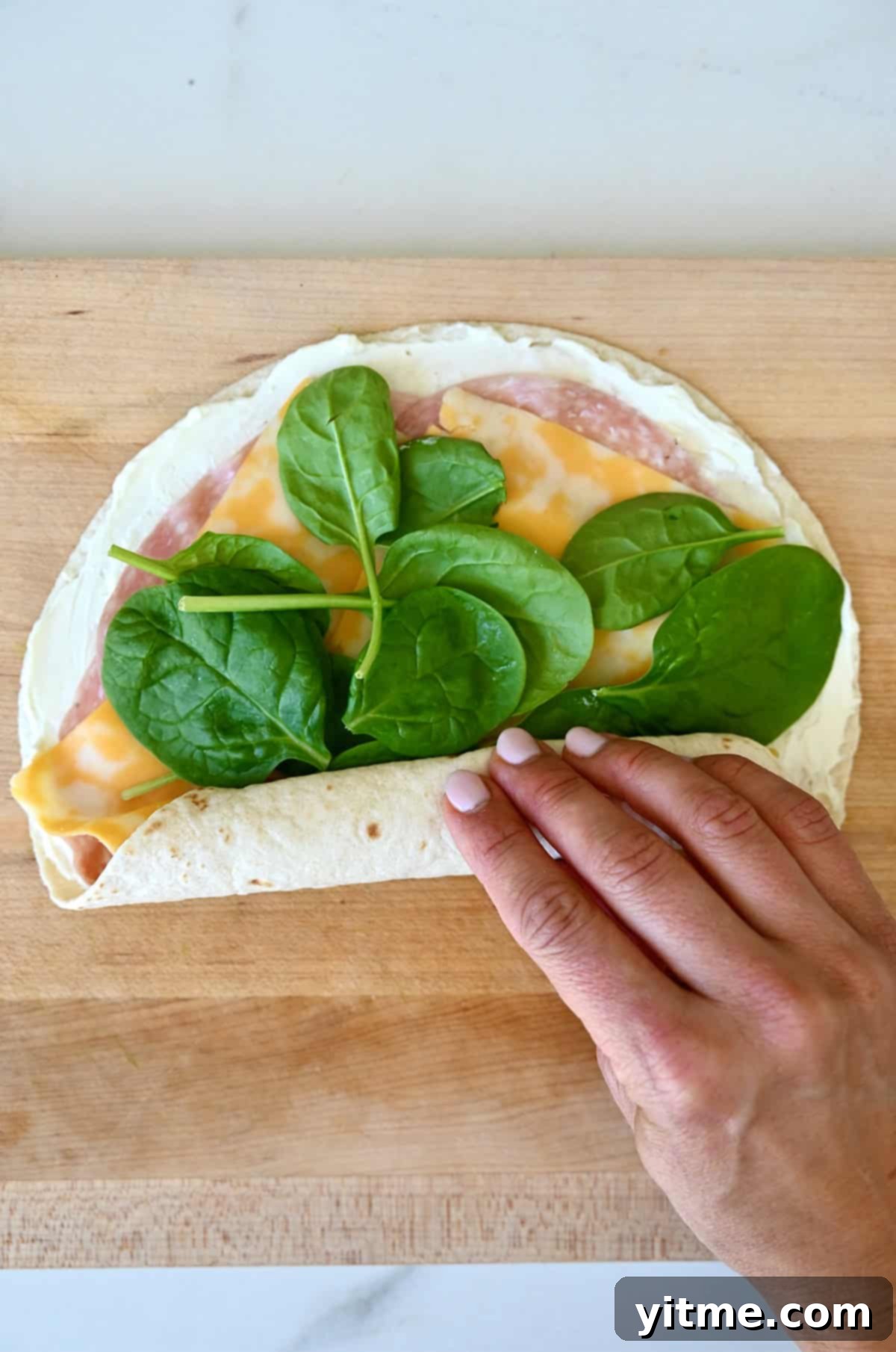 Swirl Sandwiches 6 Tightly rolling a tortilla with sandwich fillings.