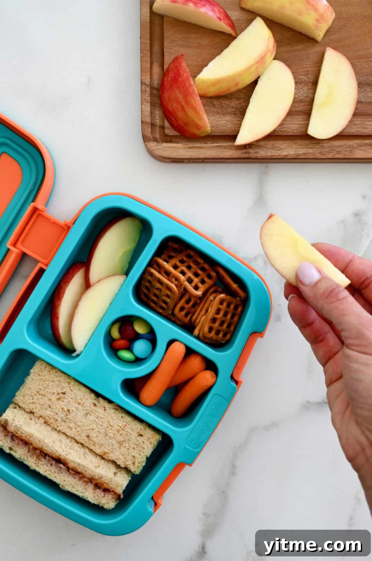 Sliced apples that haven't turned brown, tucked into a lunchbox.