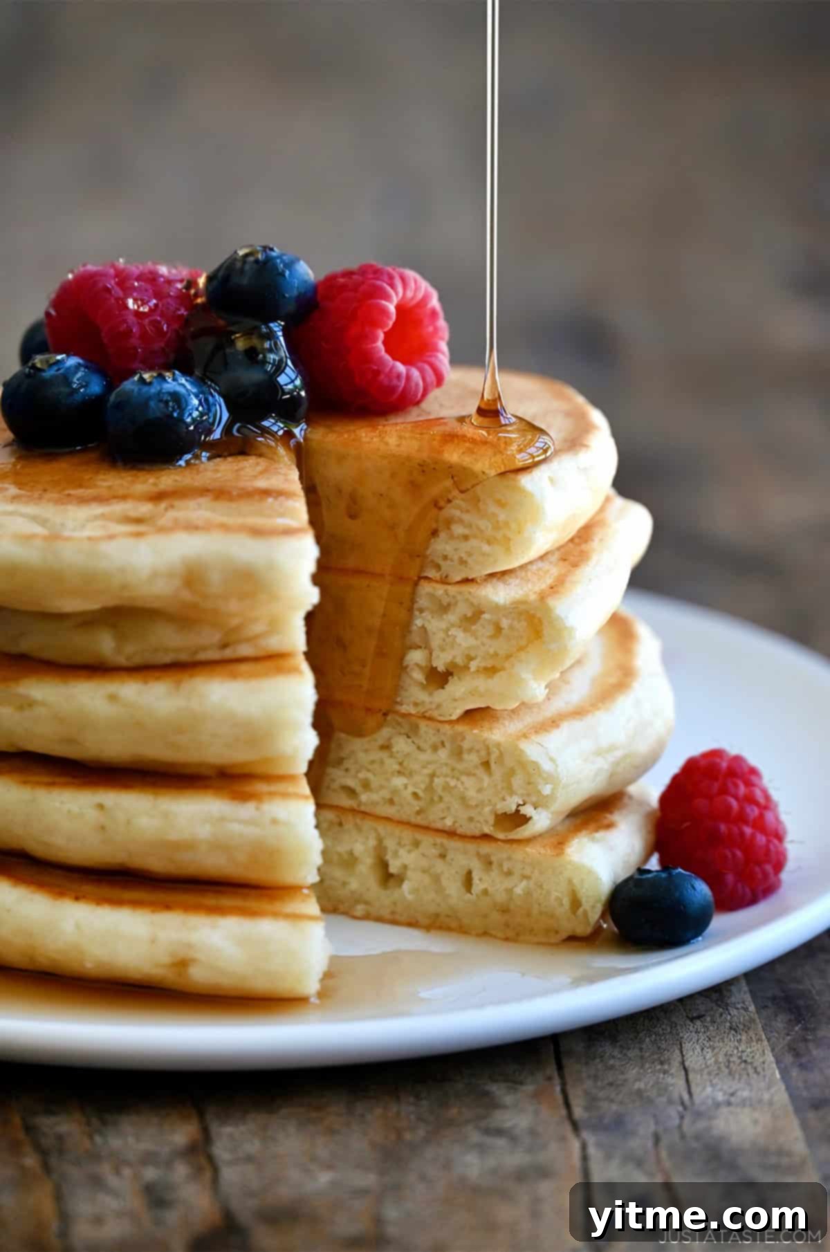 Cloud-Like Cottage Cheese Pancakes 10 A perfectly cooked stack of fluffy cottage cheese pancakes, ready to be enjoyed.
