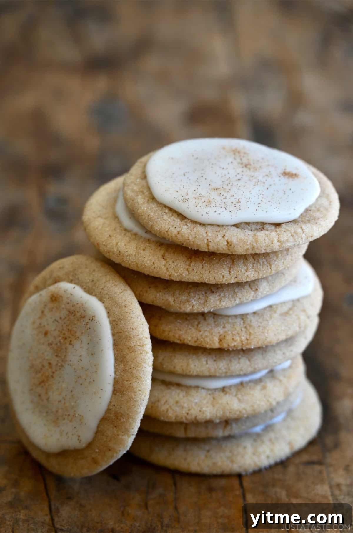 Stack of chai sugar cookies with cinnamon icing.
