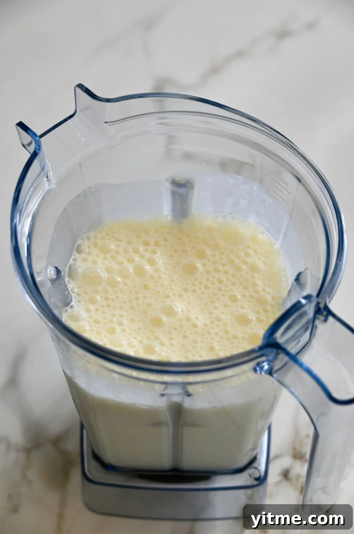 Blended cottage cheese waffle ingredients in a blender