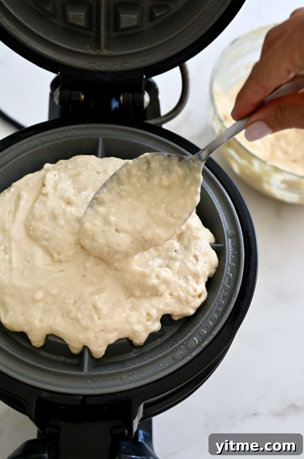 Spoon batter into a preheated waffle maker.