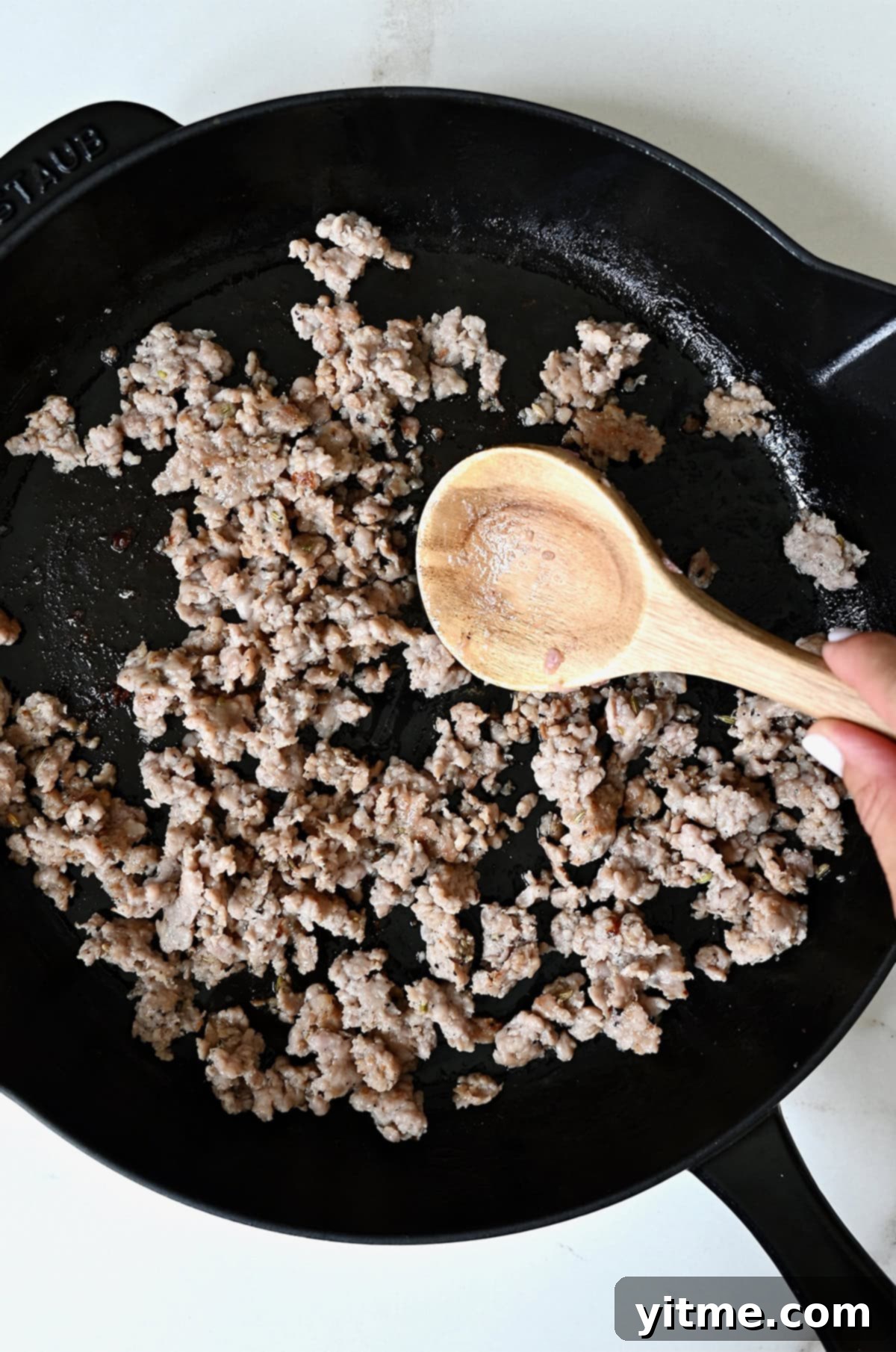 Sausage-Kissed Mushroom Bites 7 Browning the Italian sausage