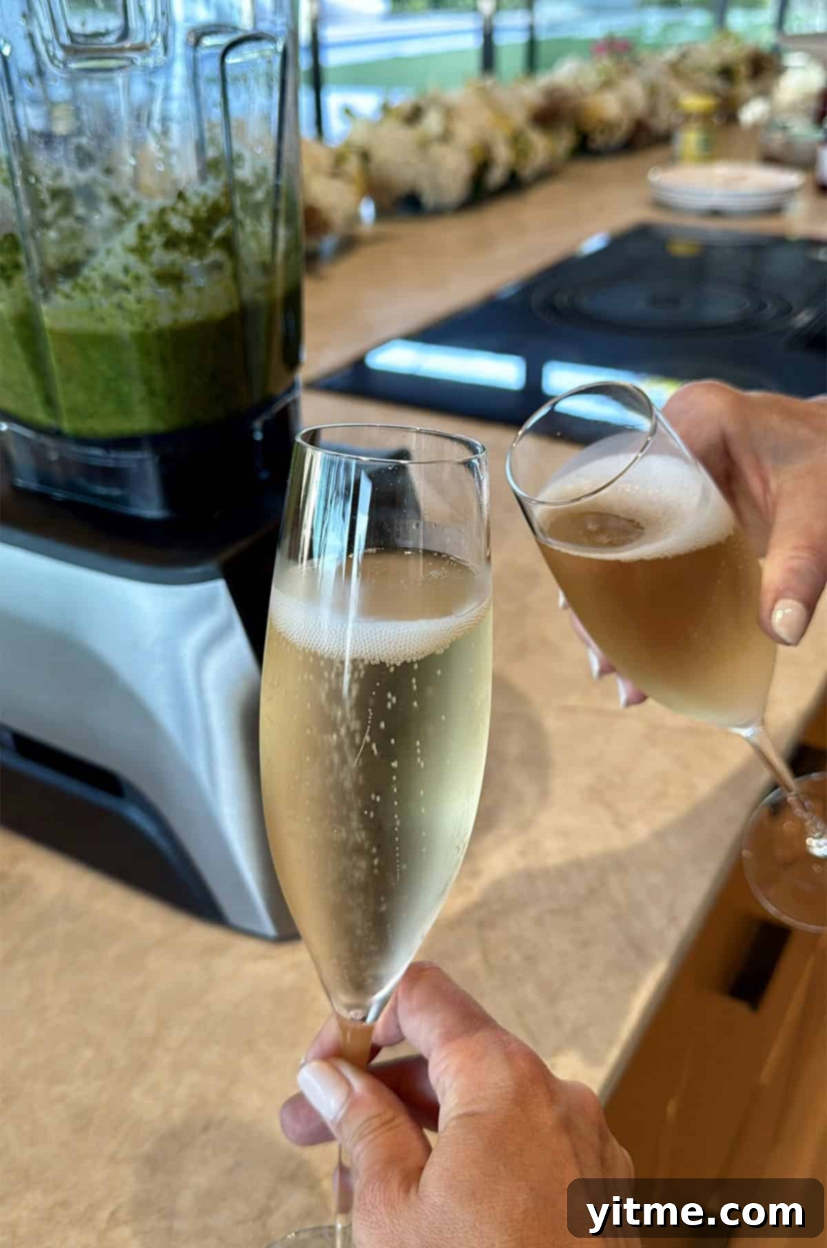 Champagne being poured at a family dinner