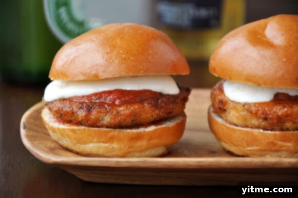 Delicious Eggplant Parmesan Sliders ready for serving, a perfect vegetarian appetizer.
